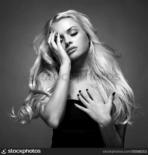 Photo of young beautiful lady with magnificent blond hair