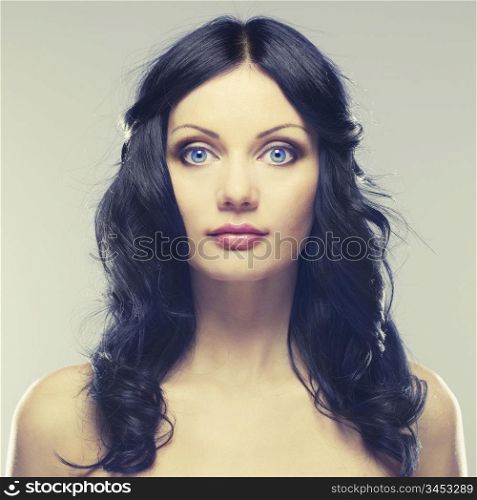 Photo of young beautiful woman with blue eyes