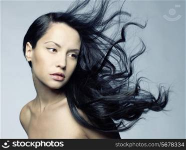 Photo of young beautiful woman with magnificent hair