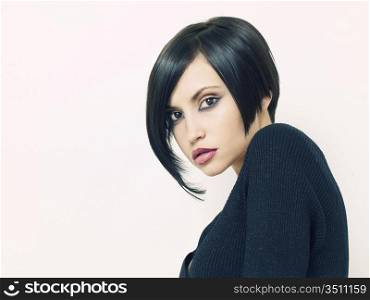 Photo of young beautiful woman with short hairstyle
