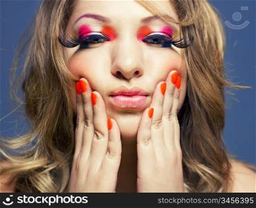Photo of young lady with bright makeup on bright background