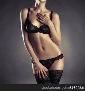 Photo of young slim woman in stylish lingerie