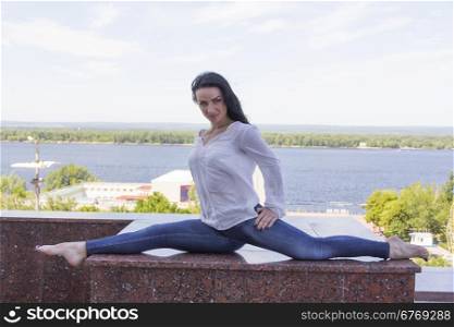 Photo of young woman in pose twine