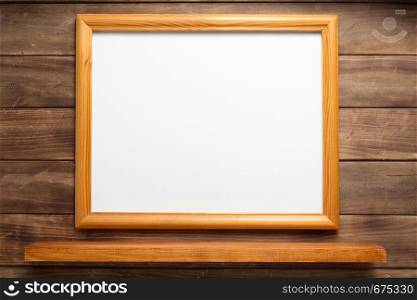 photo picture frame and shelf on wooden background