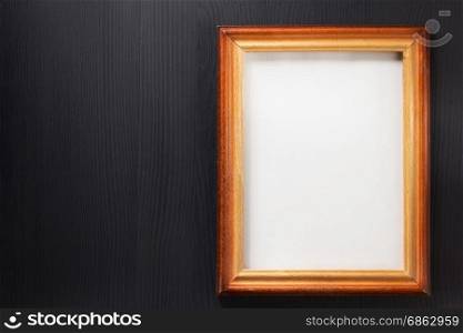 photo picture frame on wooden background