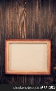 photo picture frame on wooden background