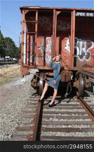 Photo shoot of a model at a railway yard