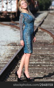 Photo shoot of a model at a railway yard