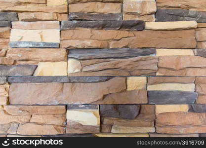 Photo stone wall of brown masonry texture