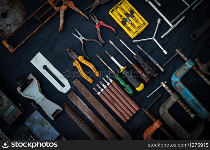 Photo top view a huge set collection of working hand and power tools many for the wooden on isolated black background, Toolset with interior, do-it-yourself DIY tool, kit flat style, Stock hardware