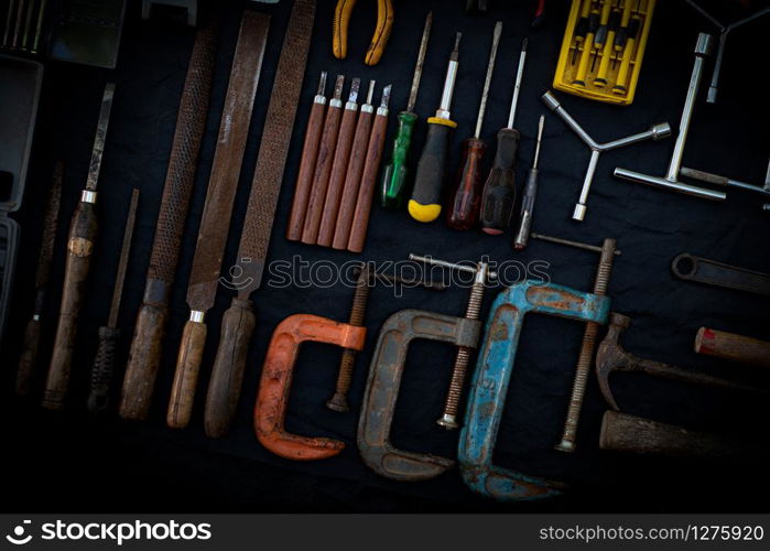 Photo top view a huge set collection of working hand and power tools many for the wooden on isolated black background, Old toolset with interior, do-it-yourself DIY tool, kit flat style, Stock hardware