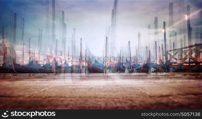 Photo with soft focus of moored Venetian gondolas, creative fine art grunge style photo, slow motion of traditional Venice city transport, Italy