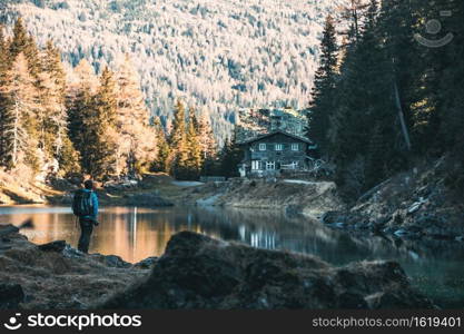 Photographer and the old hut