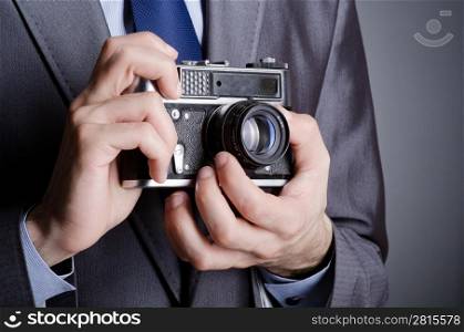 Photographer man with vintage camera
