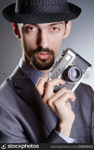 Photographer man with vintage camera