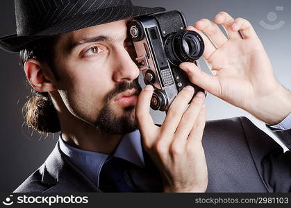 Photographer man with vintage camera