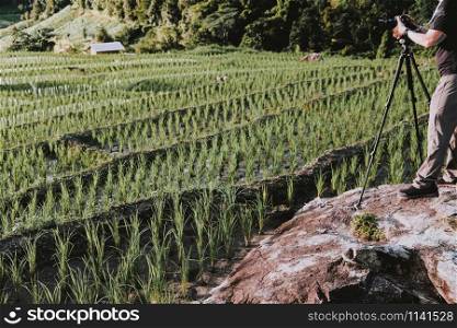 photographer take photo of rice terrace paddy field