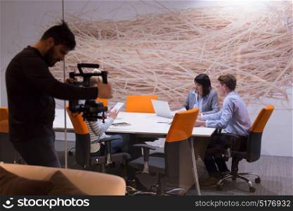 Photographer take pictures during a meeting board