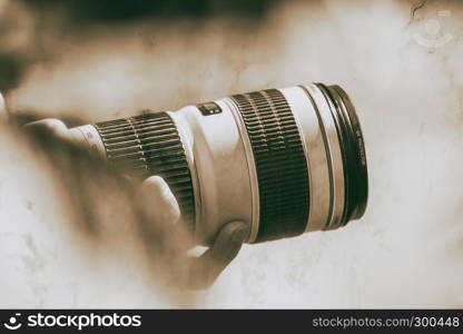 Photographing at a majot holiday event. Big zoom lens surrounded by bokeh colors.