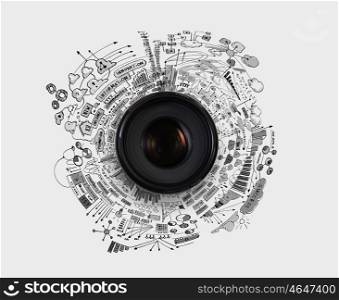 Photography concept. Camera lens against light background. Photography business