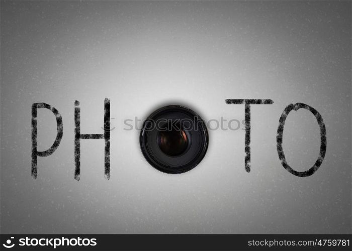 Photography. Word photo with camera zoom instead of letter O