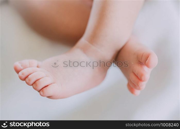 Photos closely at the foot of tiny baby be cute