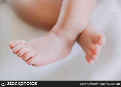 Photos closely at the foot of tiny baby be cute