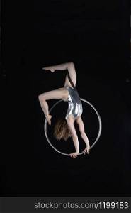 Photoshoot of a acrobat model, doing contortion, rings and aerial gymnastics
