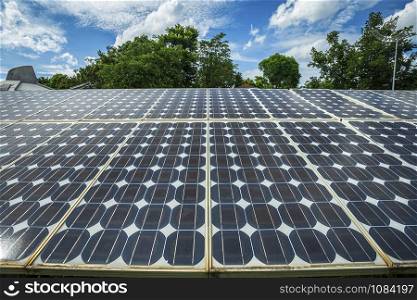 Photovoltaic modules solar power plant and blue sky sunset background, Alternative energy concept.