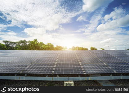 Photovoltaic modules solar power plant and blue sky sunset background, Alternative energy concept.