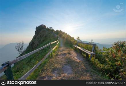 Phu Chi Dao, Chiang Rai, Thailand with forest trees and green mountain hills. Nature landscape background.