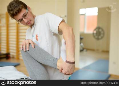 Physical therapist kinetotherapy and pacient