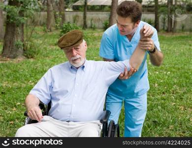 Physical therapist working with a senior man outdoors in the fresh air.
