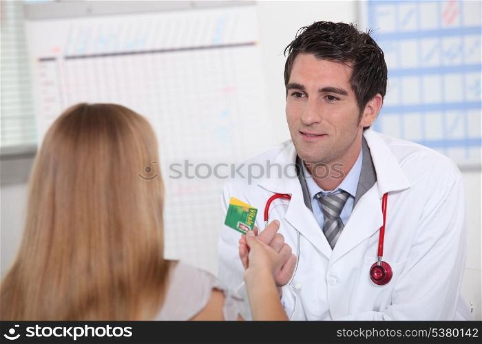 Physician meeting patient