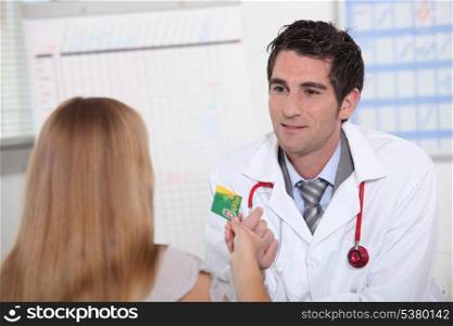Physician meeting patient