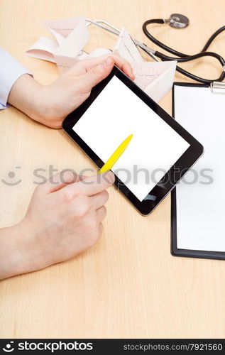 physician works with tablet pc with cut out screen