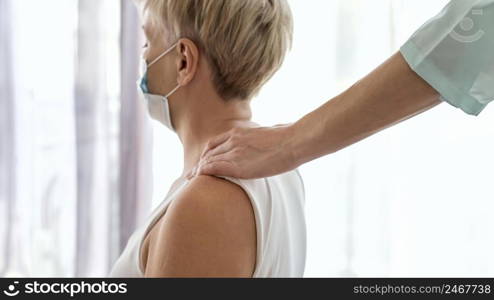 physiotherapist undergoing therapy with female patient 4