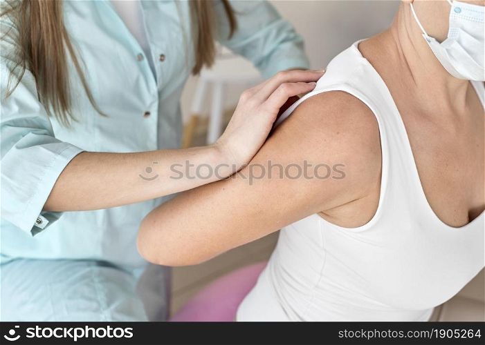 physiotherapist undergoing therapy with female patient. High resolution photo. physiotherapist undergoing therapy with female patient. High quality photo