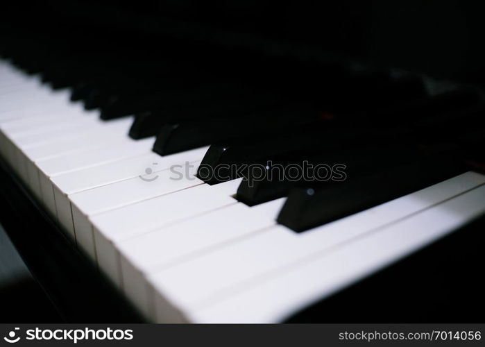 Piano keyboard background with selective focus