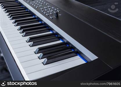 Piano Keyboard synthesizer closeup key frontal view