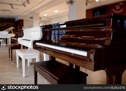 Piano shop background with many modern or vintage keyboards musical instrument display. Art studio or workshop retail sale concept. Piano shop background with many keyboards musical instrument display