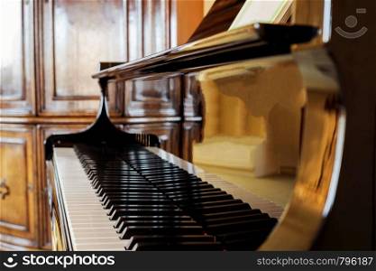 Piano shot close up. Piano keys. Musical instrument classic design beauty. Piano shot close up. Piano keys. Musical instrument classic design
