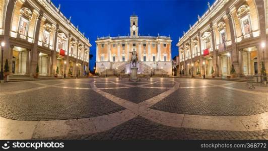 Piazza del C&idoglio on the top of Capitoline Hill with the facade of Senatorial Palace and equestrian statue of Marcus Aurelius at night, Rome, Italy. C&idoglio square on Capitoline Hill, Rome, Italy