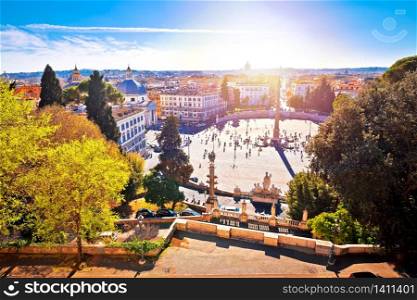 Piazza del Popolo or Peoples square in eternal city of Rome sun haze view, capital of Italy