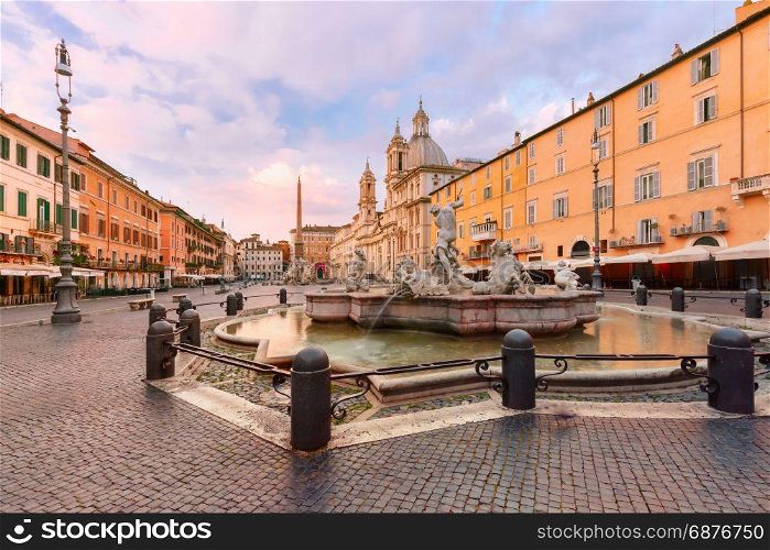 Piazza Navona Square at night, Rome, Italy.. The Fountain of Neptune on the famous Piazza Navona Square at sunrise, Rome, Italy.