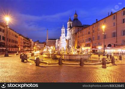 Piazza Navona Square at night, Rome, Italy.. The Fountain of Neptune on the famous Piazza Navona Square at night, Rome, Italy.