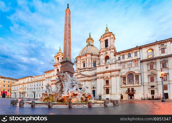 Piazza Navona Square in the morning, Rome, Italy.. Fountain of the Four Rivers with an Egyptian obelisk and Sant Agnese Church on the famous Piazza Navona Square in the morning, Rome, Italy.