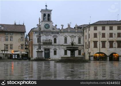 Piazza San Giacomo in the city of Udine in Italy in the rain