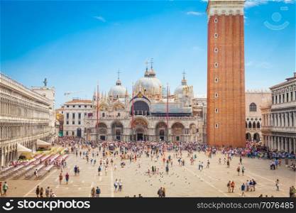 Piazza San Marco with the Basilica of Saint Mark and the bell tower of St Mark's Campanile (Campanile di San Marco) in Venice, Italy, September 09, 2015.