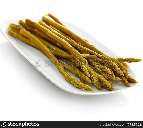 Pickled Asparagus In A White Dish